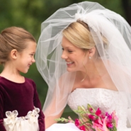 beautiful bride with flower girl