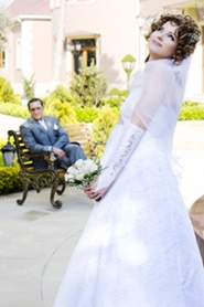 classic photograph of groom and bride in lovely wedding gown